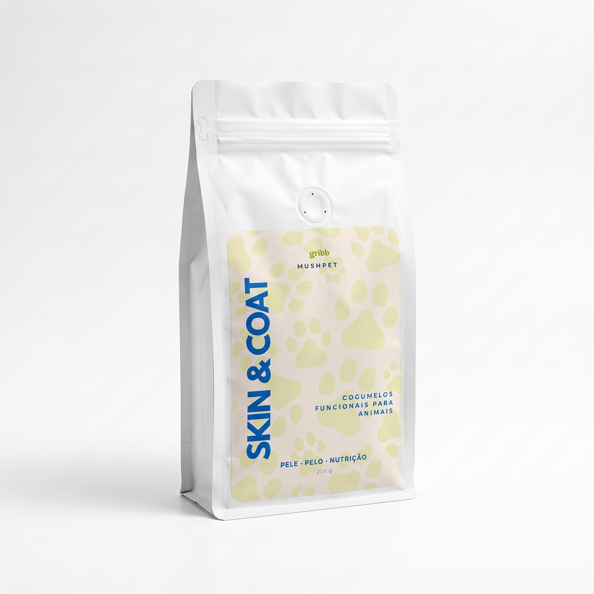 A white stand-up pouch of SKIN & COAT pet grooming balm by muspet, featuring a pale yellow paw-print pattern and blue text, set against a clean white background.