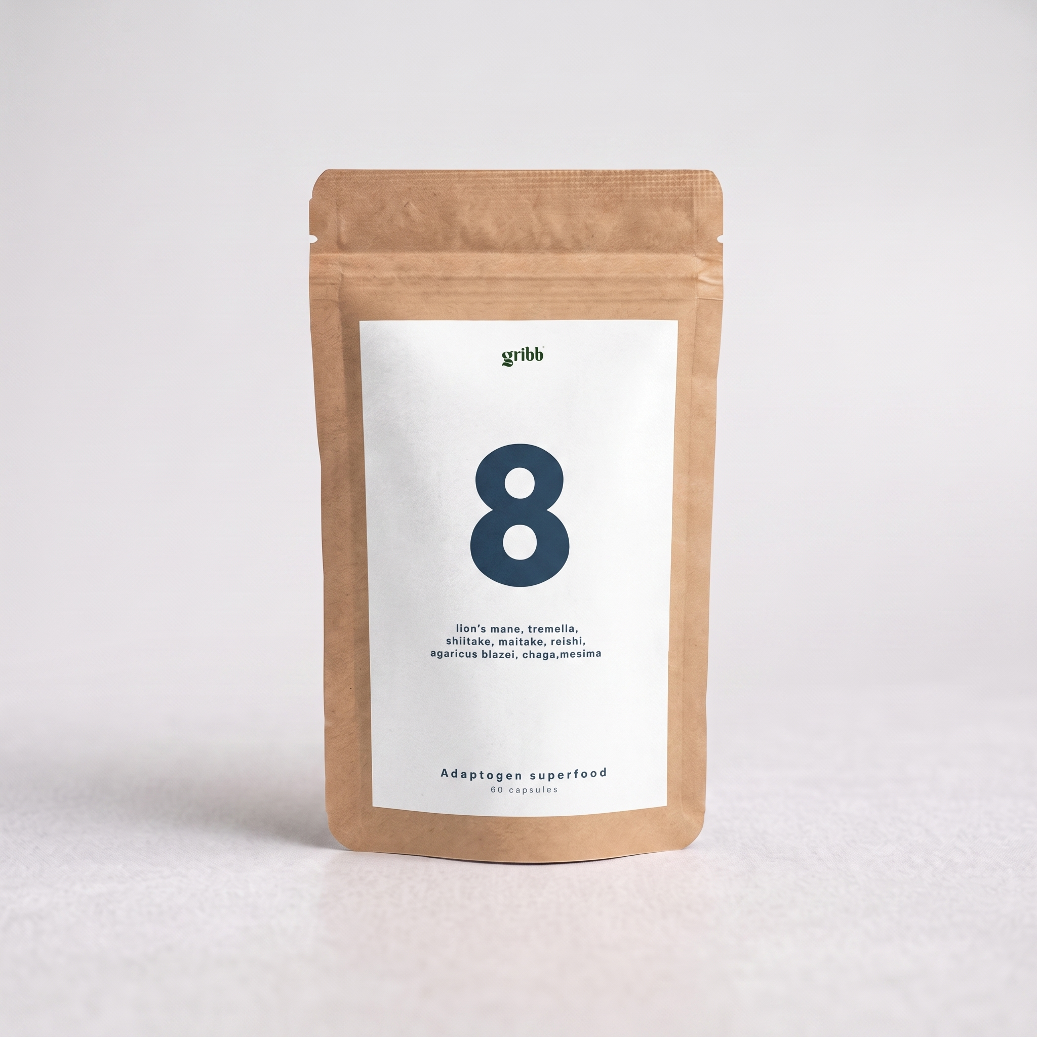 A kraft paper stand-up pouch with a white label featuring a large dark blue number 8 and the brand name 'gribb' at the top, photographed on a light gray background.