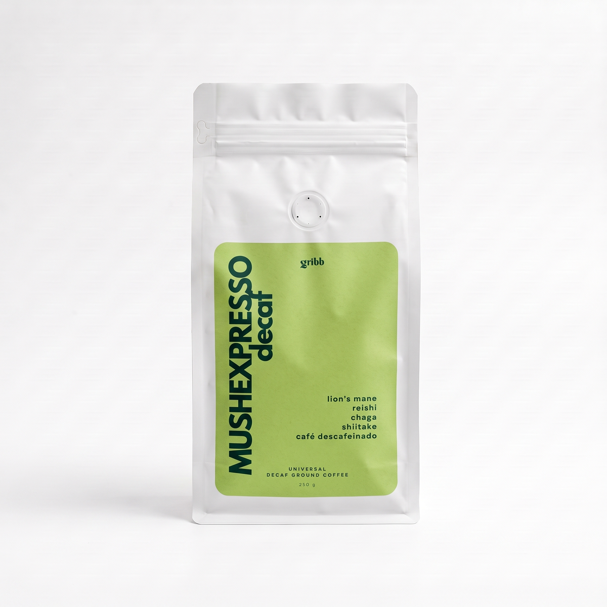 A white stand-up coffee bag with a large light green label reading 'MUSHEXPRESSO decaf' and smaller text 'grillb', photographed on a clean white background.